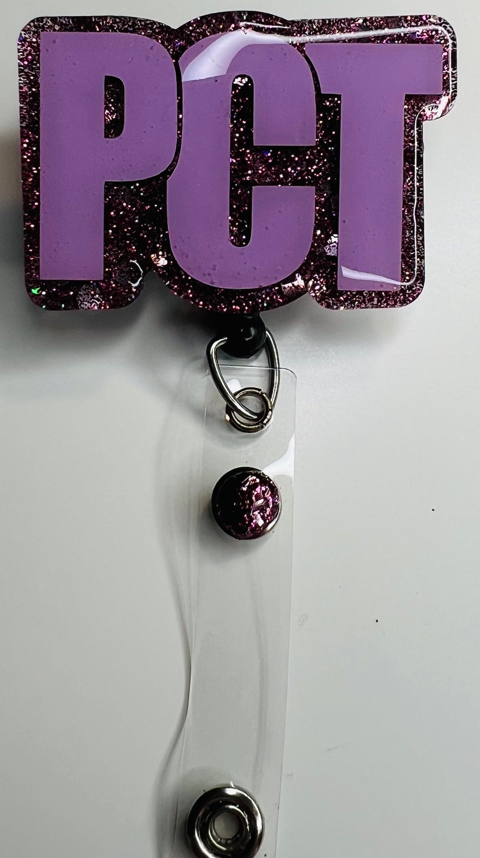 Retractable badge clip